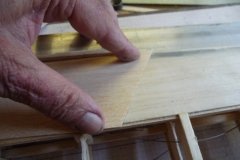 Checking replacement leading edge sheet is accurately cut